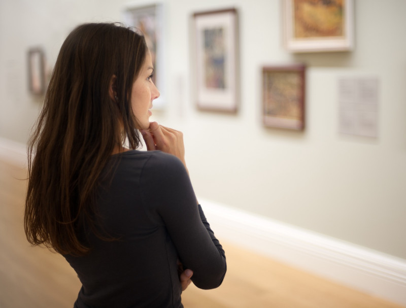 A woman in a gallery