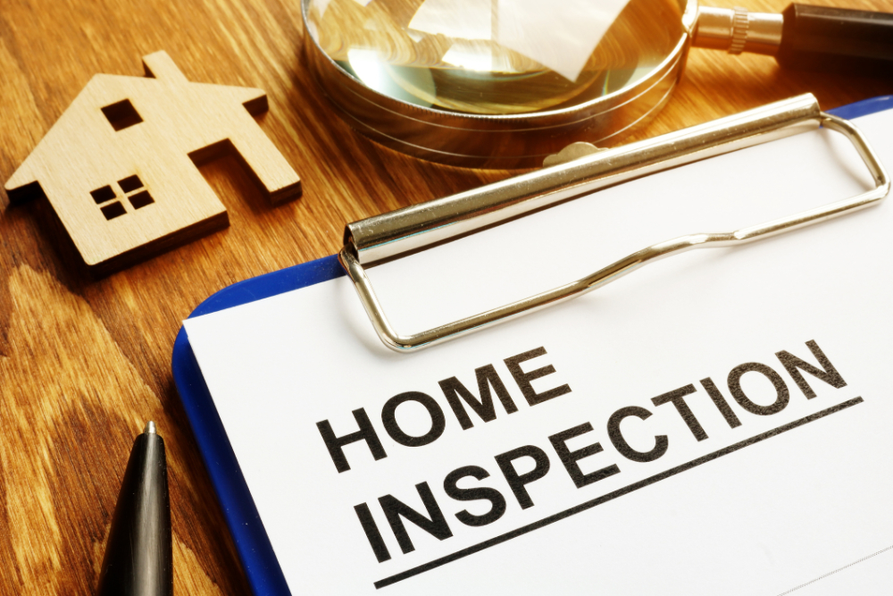 Home inspection form with clipboard and pen